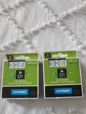 Dymo D1 Label Cassettes in Green and Black Packaging